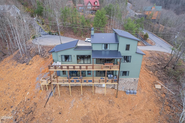 1505 Misty Ct, Sevierville, TN 37862 - back of property with a balcony and a metal roof