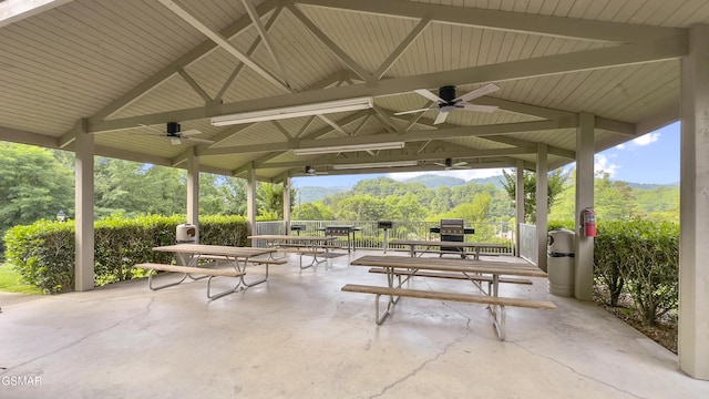205 Ogle Dr Unit 614, Pigeon Forge, TN 37863 - view of patio featuring ceiling fan, a gazebo, outdoor dining area, and a mountain view