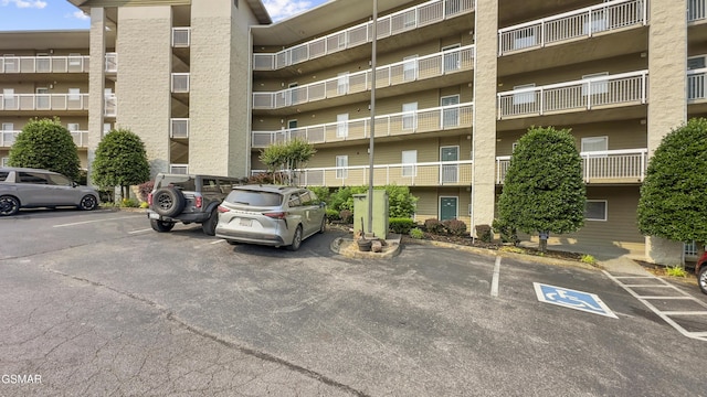 205 Ogle Dr Unit 614, Pigeon Forge, TN 37863 - view of apartment building / complex featuring uncovered parking