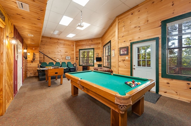 playroom with carpet floors, wood walls, visible vents, and pool table