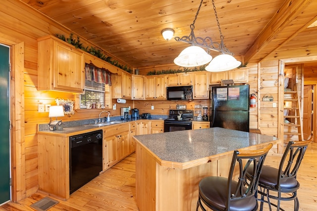 kitchen featuring wood ceiling, black appliances, a sink, and light wood-style flooring