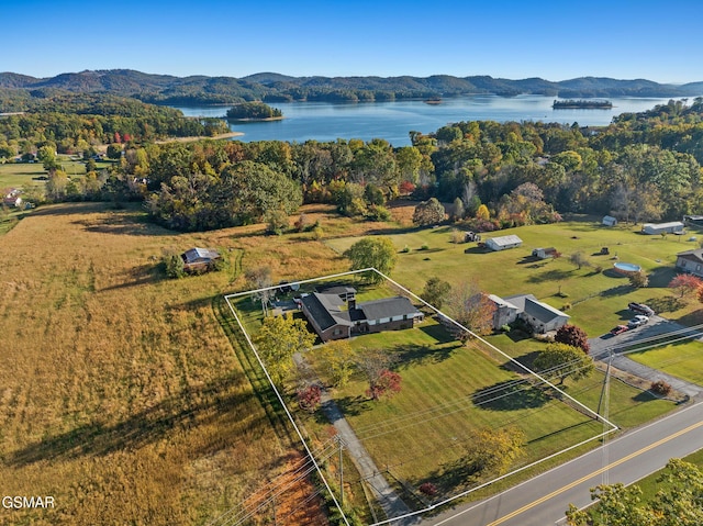 aerial view featuring a water and mountain view