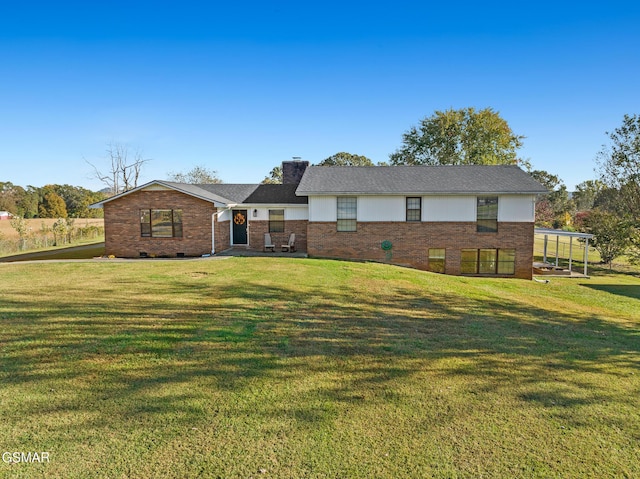 ranch-style home with a front yard