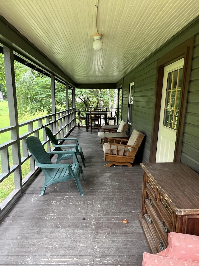 sunroom / solarium featuring plenty of natural light