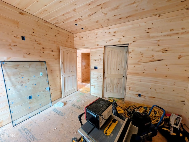 bedroom with wooden walls