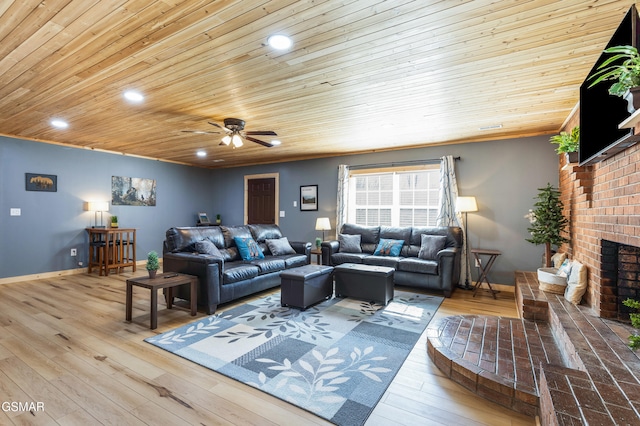 4323 Boogertown Rd, Sevierville, TN 37876 - living room featuring wood-type flooring, a brick fireplace, ceiling fan, wooden ceiling, and recessed lighting