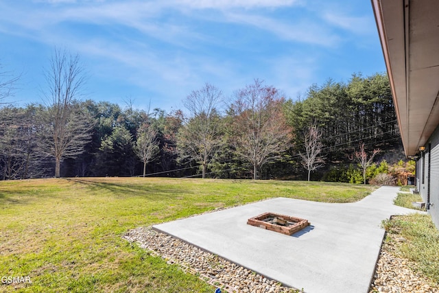 4323 Boogertown Rd, Sevierville, TN 37876 - view of yard featuring an outdoor fire pit and a patio