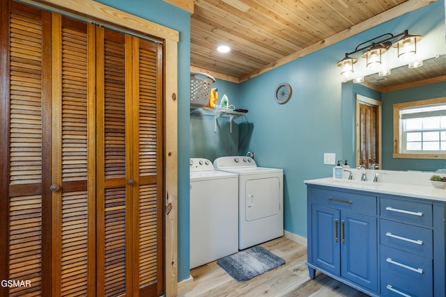 4323 Boogertown Rd, Sevierville, TN 37876 - washroom featuring washer and dryer, light wood-style floors, wood ceiling, and a sink