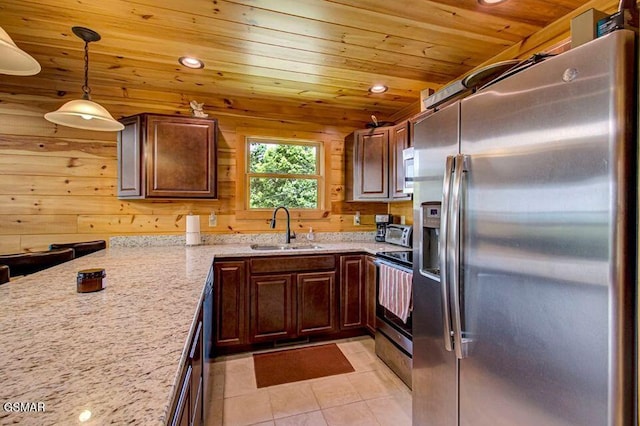 kitchen with wooden ceiling, light tile patterned flooring, a sink, appliances with stainless steel finishes, and light stone countertops