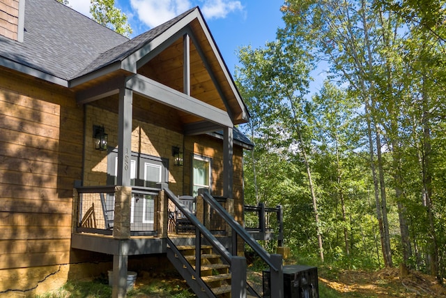 entrance to property with a deck