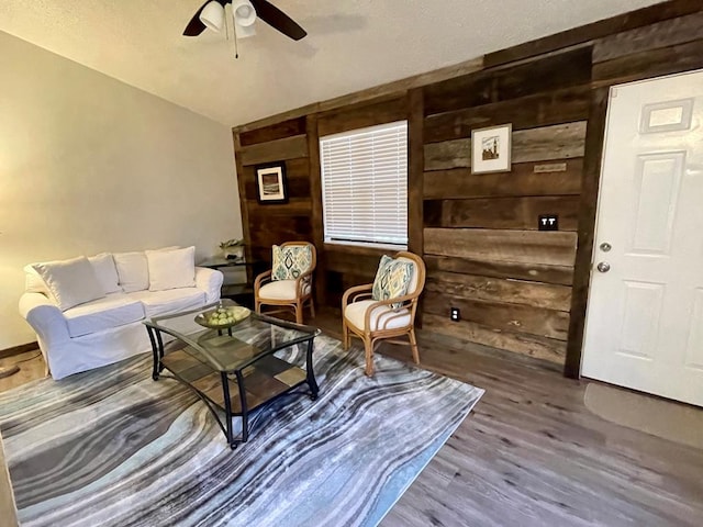 4955 Ledford Rd, Cosby, TN 37722 - living area featuring ceiling fan, wooden walls, and wood finished floors