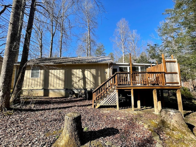 4955 Ledford Rd, Cosby, TN 37722 - back of property featuring stairs, board and batten siding, and a wooden deck