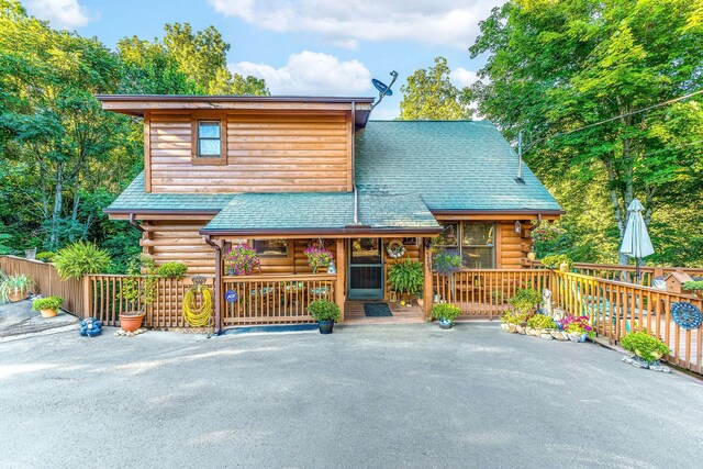 view of log cabin