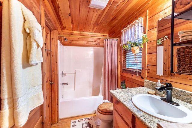 full bathroom featuring shower / bathtub combination with curtain, wooden ceiling, toilet, wooden walls, and vanity