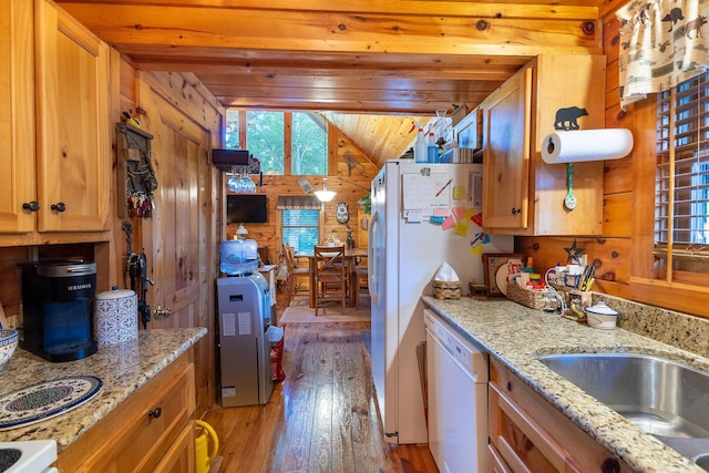 kitchen with light stone counters, light hardwood / wood-style flooring, wood walls, white dishwasher, and wood ceiling