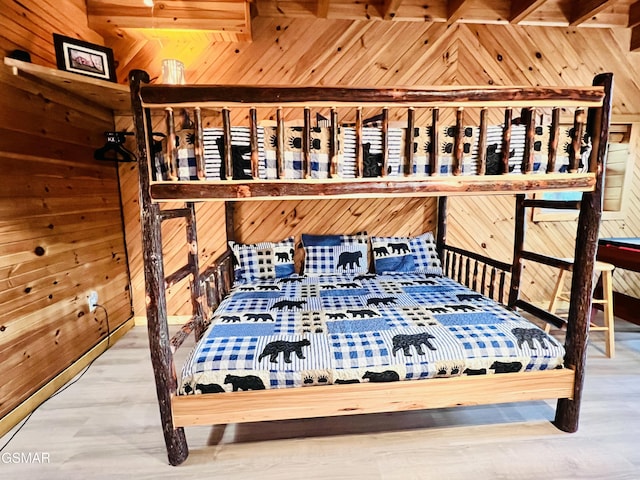 2527 Raccoon Hollow Way, Sevierville, TN 37862 - bedroom featuring wood walls and wood finished floors