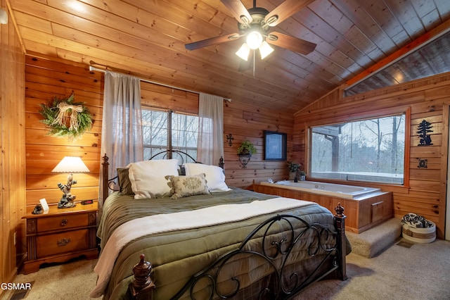 2210 Hawks Point Way, Sevierville, TN 37862 - bedroom with a ceiling fan, wood walls, lofted ceiling, wood ceiling, and light colored carpet