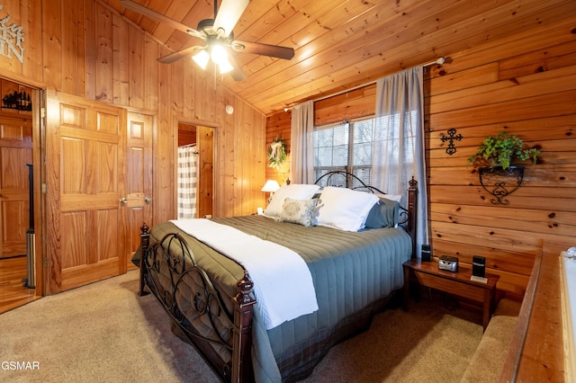 2210 Hawks Point Way, Sevierville, TN 37862 - bedroom with lofted ceiling, wood walls, ceiling fan, carpet, and wood ceiling