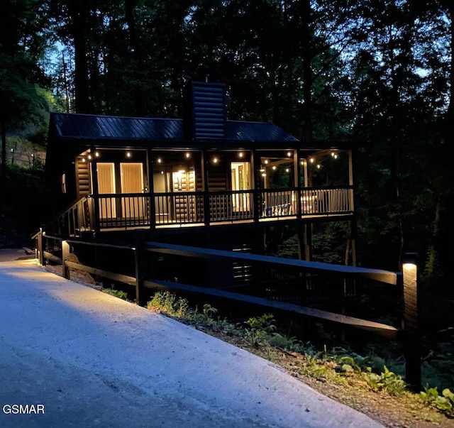 view of front of property featuring a deck