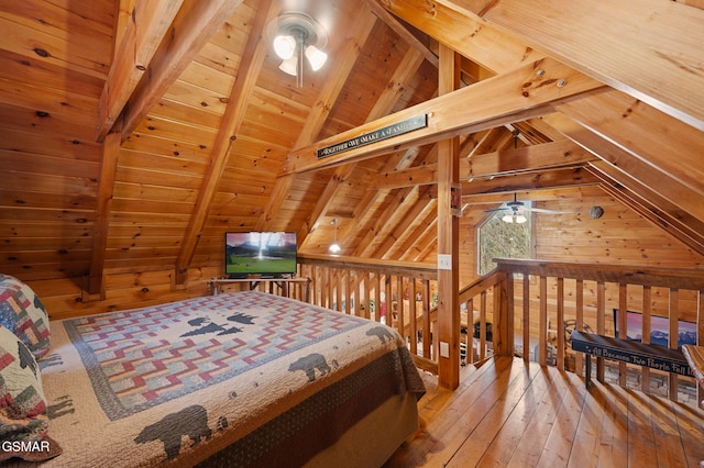 bedroom featuring wood-type flooring, vaulted ceiling with beams, wood ceiling, and wood walls