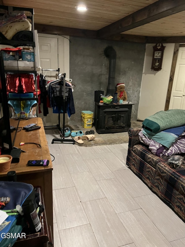 815 Hartsell Rd, Newport, TN 37821 - basement featuring a wood stove, wood ceiling, and recessed lighting