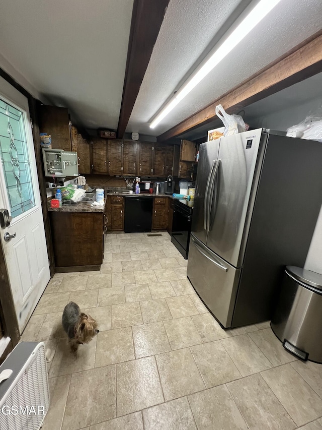 815 Hartsell Rd, Newport, TN 37821 - kitchen featuring black dishwasher, freestanding refrigerator, dark brown cabinetry, dark countertops, and electric stove