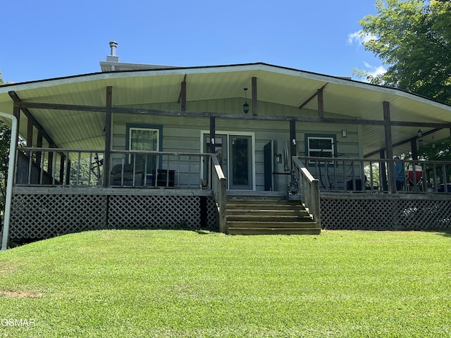815 Hartsell Rd, Newport, TN 37821 - rear view of house with covered porch and a yard