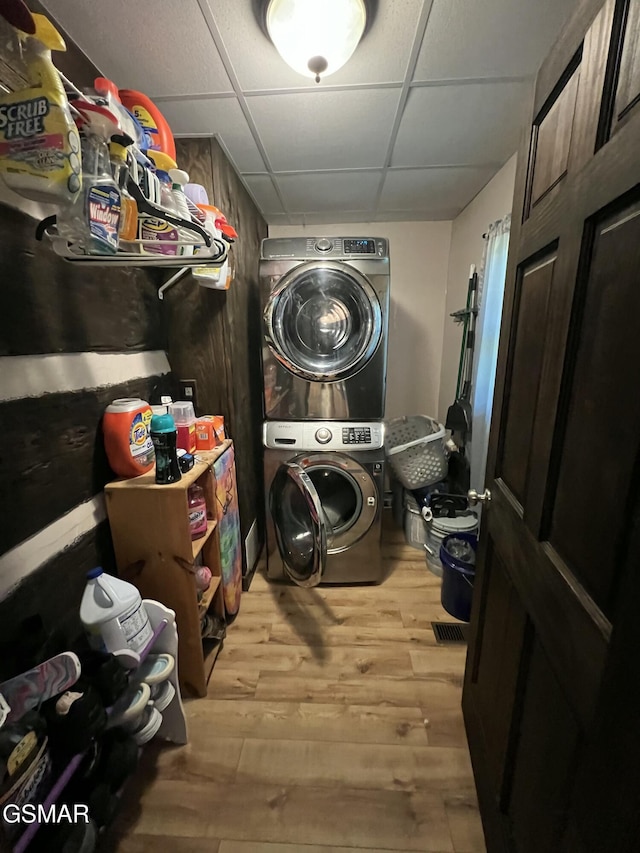815 Hartsell Rd, Newport, TN 37821 - laundry room with stacked washer / drying machine and wood finished floors