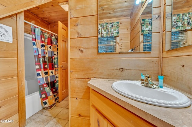 bathroom with shower / bathtub combination with curtain, wooden ceiling, tile patterned flooring, wooden walls, and vanity