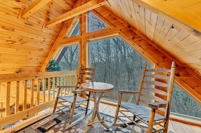 bonus room with lofted ceiling with beams, light hardwood / wood-style floors, and wood ceiling