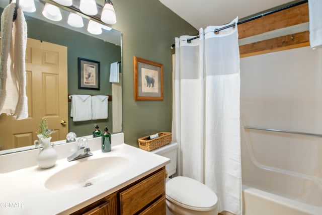 bathroom featuring shower / bath combination with curtain, vanity, and toilet