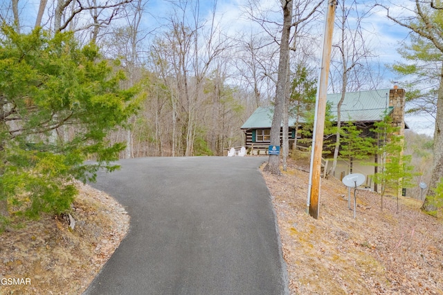 view of road featuring driveway