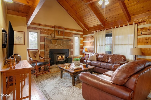 living room featuring wood ceiling, a ceiling fan, wood-type flooring, and beam ceiling