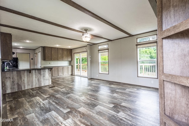 1138 Douglas Dam Rd, Dandridge, TN 37725 - unfurnished living room with dark wood finished floors, plenty of natural light, recessed lighting, and beam ceiling