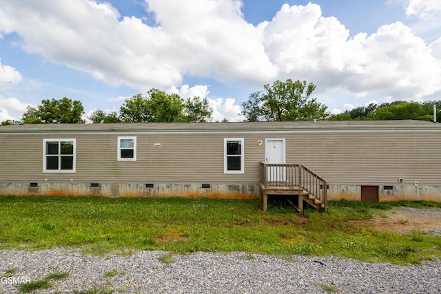 1138 Douglas Dam Rd, Dandridge, TN 37725 - rear view of house with crawl space