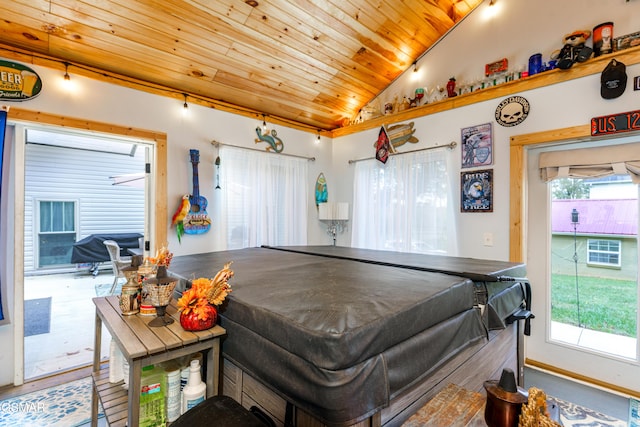 recreation room with lofted ceiling and wooden ceiling