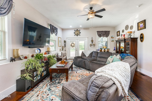 living room featuring french doors, hardwood / wood-style flooring, and ceiling fan