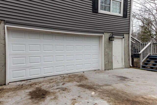 garage featuring driveway