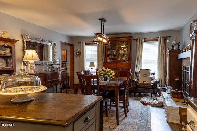 dining area with wood finished floors