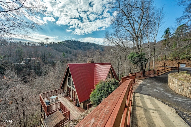 exterior space featuring a mountain view