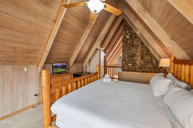 carpeted bedroom with wooden walls, vaulted ceiling with beams, and wood ceiling