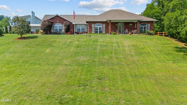 854 River Cliff Dr, Kodak, TN 37764 - ranch-style house with a front lawn and brick siding