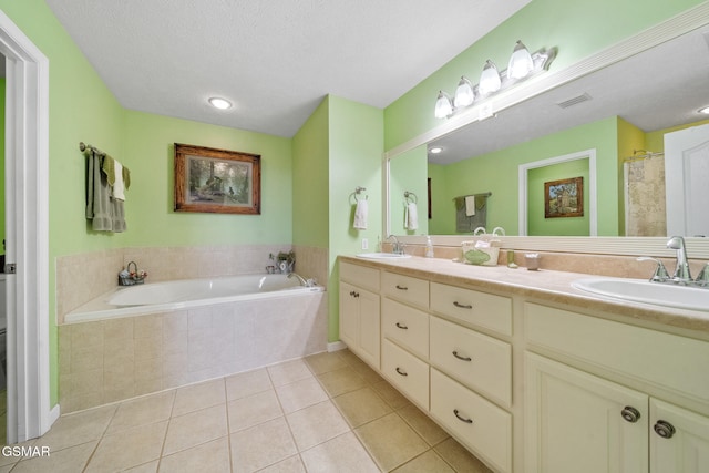 854 River Cliff Dr, Kodak, TN 37764 - bathroom with double vanity, tile patterned flooring, and a garden tub