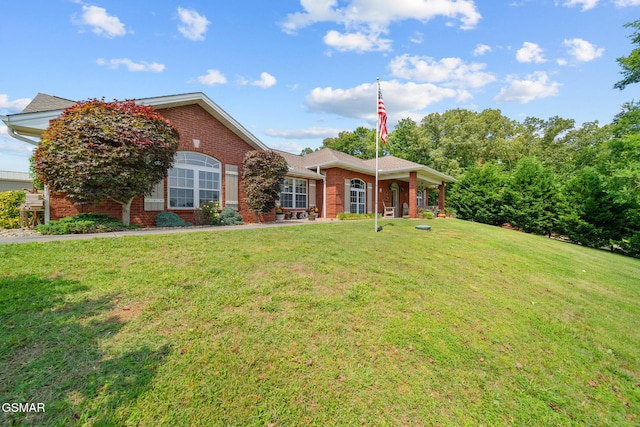 854 River Cliff Dr, Kodak, TN 37764 - single story home with brick siding and a front lawn