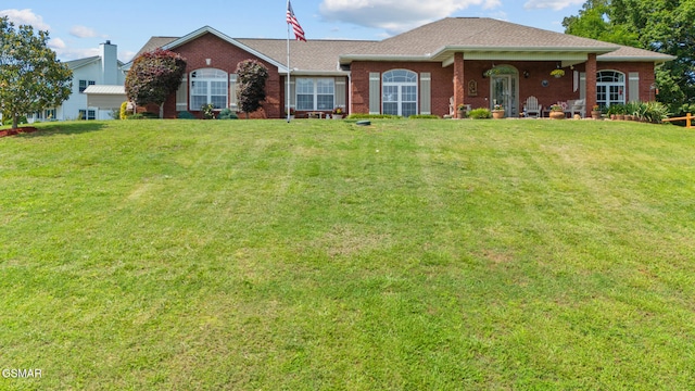 854 River Cliff Dr, Kodak, TN 37764 - view of front of house featuring a front lawn and brick siding