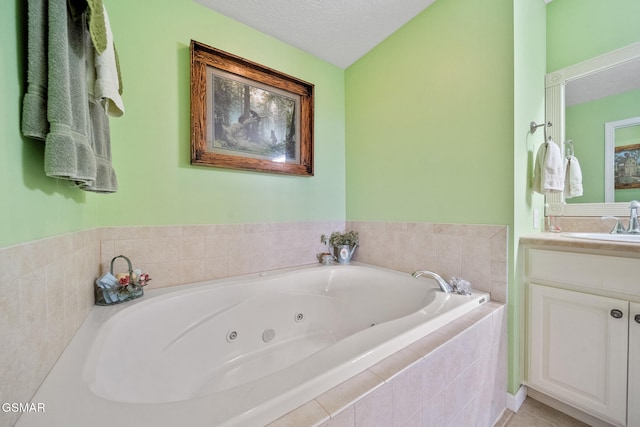 854 River Cliff Dr, Kodak, TN 37764 - full bath with vanity, a whirlpool tub, and a textured ceiling