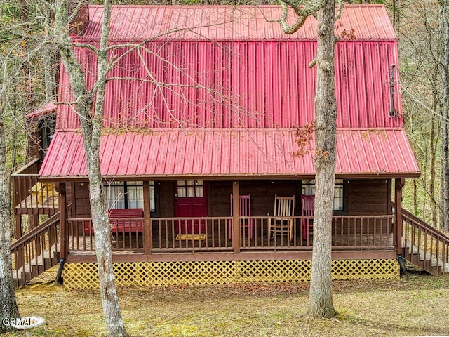 1785 Blue Ridge Rd, Sevierville, TN 37876 - rear view of property with a barn, stairs, metal roof, and a porch
