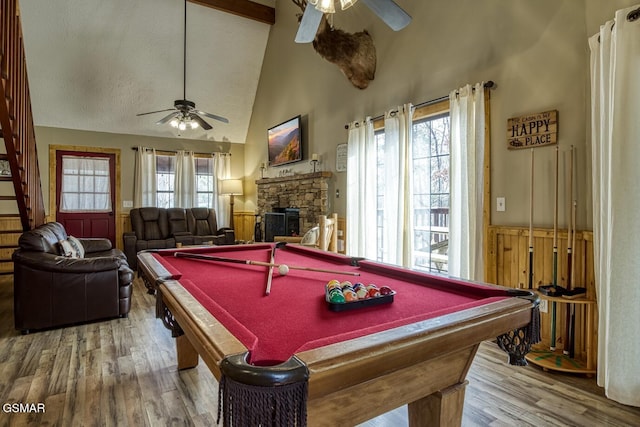 1785 Blue Ridge Rd, Sevierville, TN 37876 - recreation room featuring a ceiling fan, high vaulted ceiling, wood finished floors, pool table, and a stone fireplace