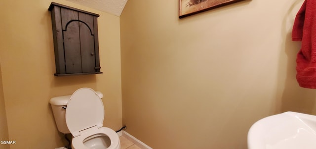 1003 Woullard Way Unit 1, Sevierville, TN 37876 - bathroom with tile patterned floors and a textured ceiling