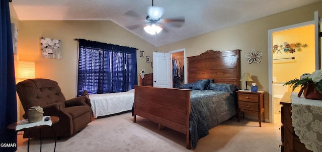 1003 Woullard Way Unit 1, Sevierville, TN 37876 - bedroom featuring carpet flooring, vaulted ceiling, a walk in closet, ensuite bathroom, and ceiling fan